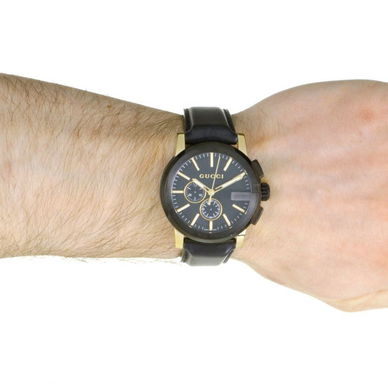 Brand: Gucci Series: G-Chrono Model: YA101203 Gender: Men's Movement: Quartz Water Resistance: 50 meters / 165 feet Features: Chronograph, Gold, Leather, Stainless Steel