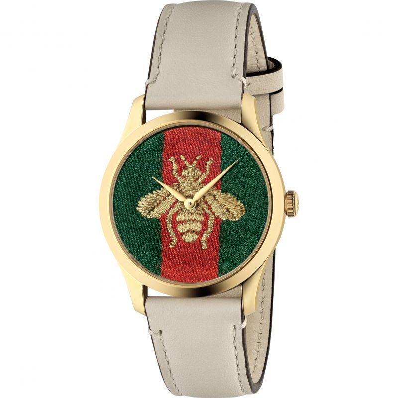 Brand: Gucci Series: G-Timeless Model: YA1264128 Gender: Ladies Movement: Quartz Water Resistance: 50 meters / 165 feet Features: Stainless Steel, Leather, Gold, Analog