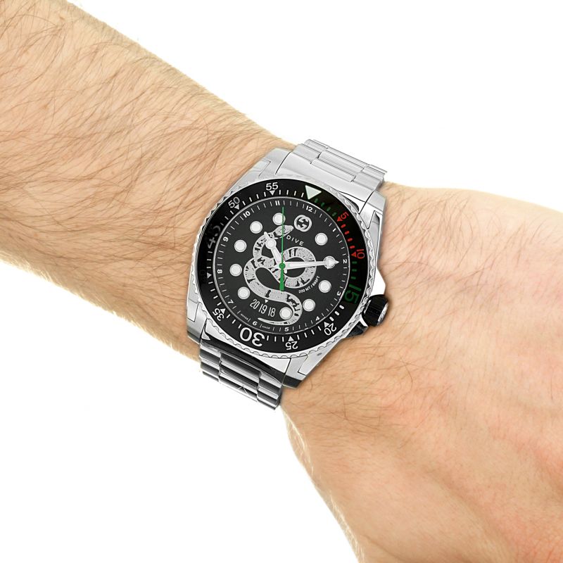 Brand: Gucci Series: Dive Model: YA136218 Gender: Men's Movement: Quartz Water Resistance: 200 meters / 660 feet Features: Stainless Steel, Ceramic, Analog
