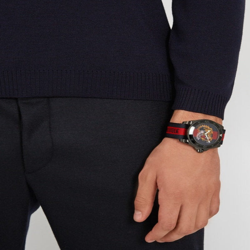 Brand: Gucci Series: Dive Model: YA136215 Gender: Men's Movement: Quartz Water Resistance: 200 meters / 660 feet Features: Stainless Steel